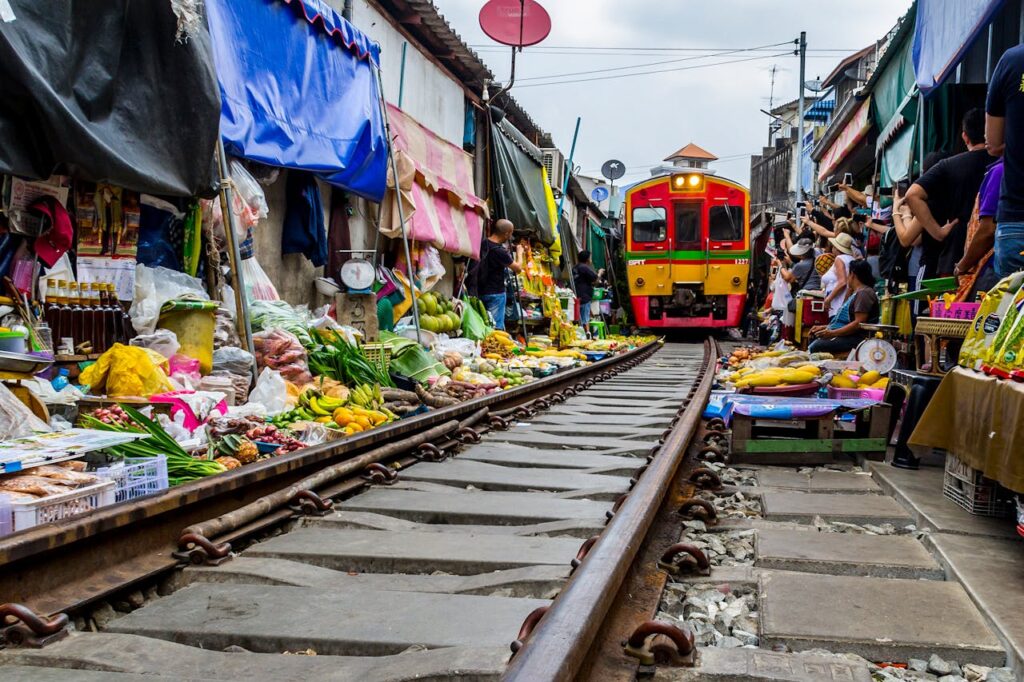 Explore Bangkok’s Hidden Gems: Amphawa Floating Market & Railway Market Tour